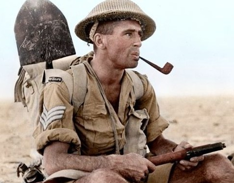 WW2 Kiwi Soldier smoking a pipe during a rest in the Middle East.